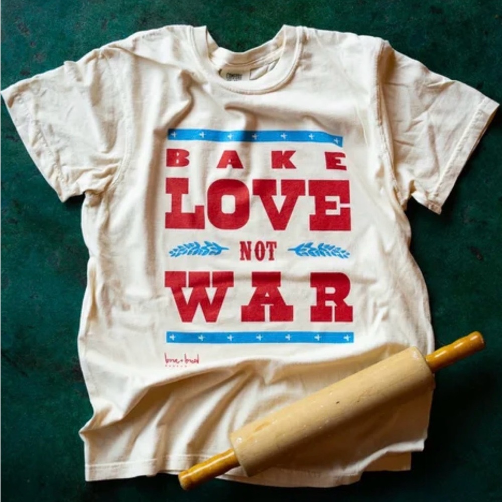 Comfort Colors Women’s ‘Bake Love Not War' Tee - Cream with Red and Blue